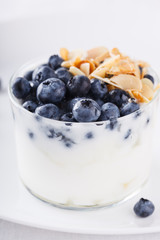 Homemade yoghurt with blueberry,almond and honey.selective focus