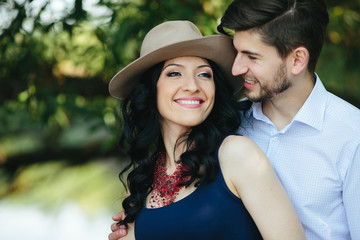 man embracing his girlfriend