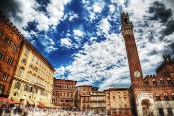 Piazza del Campo in Siena under a dramatic sky in hdr