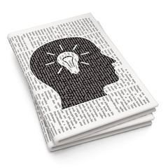 Studying concept: Head With Light Bulb on Newspaper background
