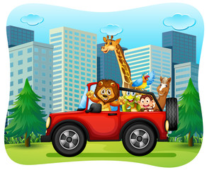 Obraz na płótnie Canvas Wild animals riding on red jeep