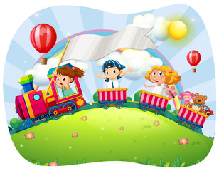 Obraz premium Children riding on train at daytime