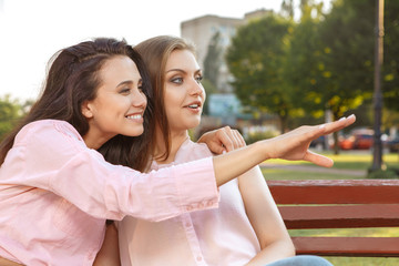 Two women sitting on the bench