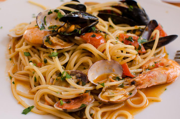 The dish of spaghetti con frutti di mare - spaghetti with seafoo