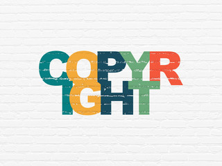 Law concept: Copyright on wall background