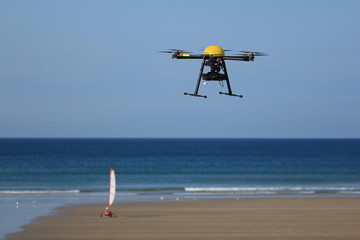 Drone Flying Over Beach
