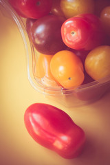Variety of grape tomatoes with retro filter effect