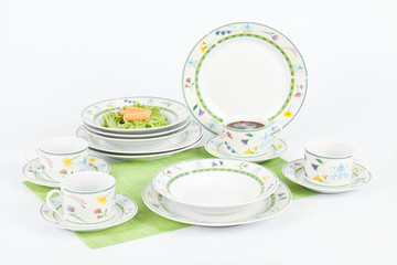 White modern dishes with figures flowers shapes