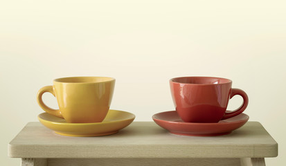 colorful cups on wooden table