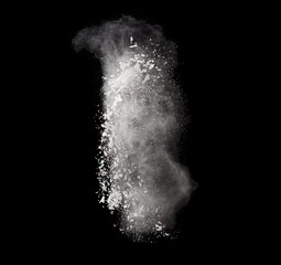 Freeze motion of white dust explosion isolated on black 