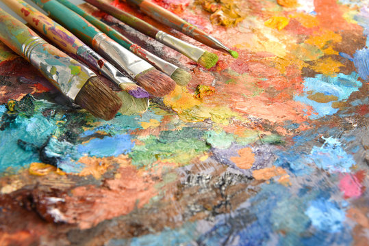 Artist Paintbrushes Over Palette