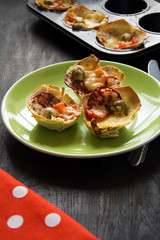Mini pizza on dark background