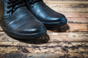black shoes on wood