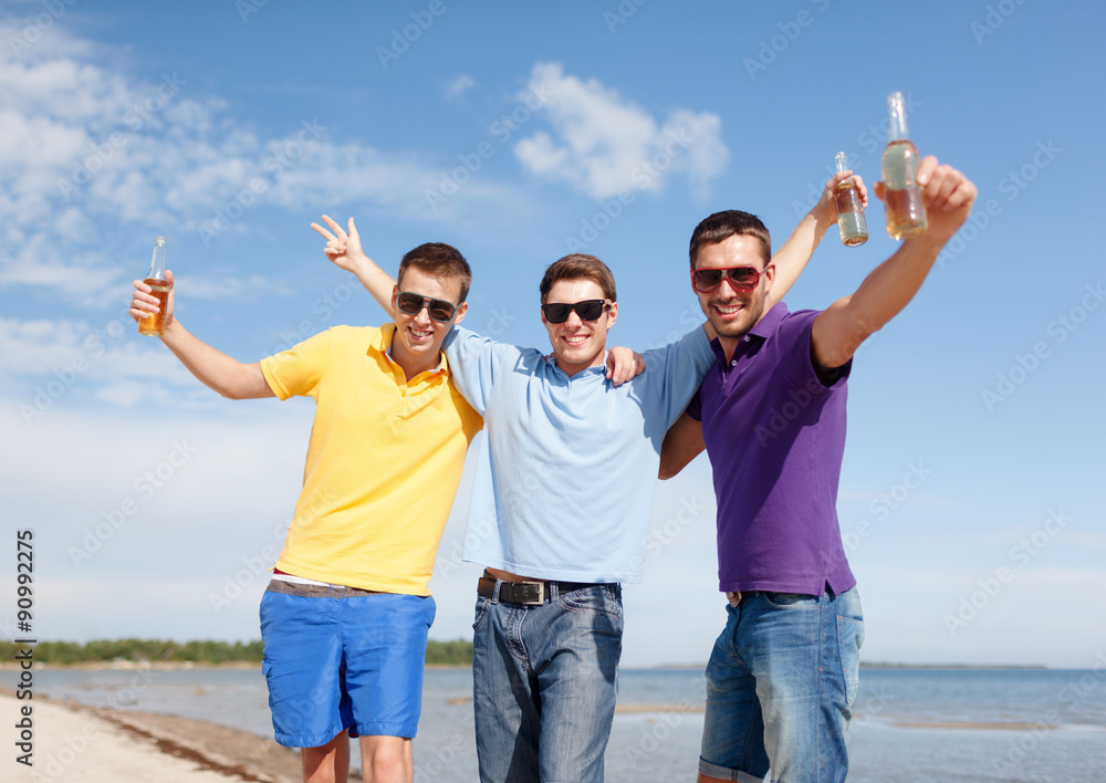 Sticker happy friends with beer bottles on beach