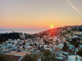 Sunset over sea and Montenegro town