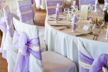 wedding chairs with ribbon, event place