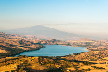 The lake of Pozzillo, with volcano Etna in background