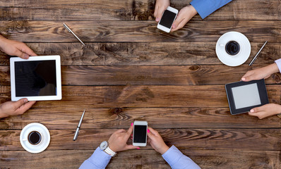 High-Tech Human Generation Lifestyle Hands of Group Young People Sitting At Natural Vintage Looking...