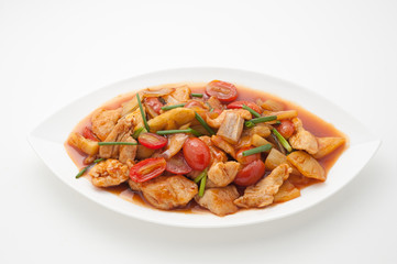 Fried chicken with cashew nuts isolated on white