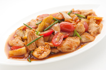 Fried chicken with cashew nuts isolated on white