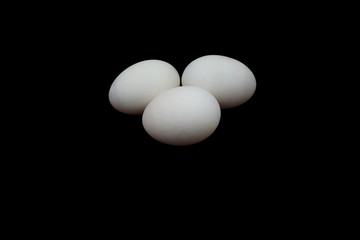 duck eggs , isolate on black background