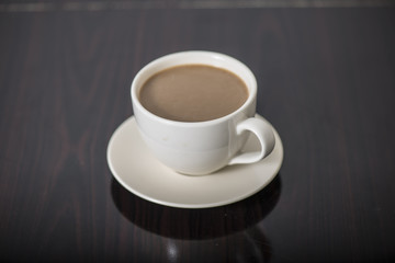 Soft focus Cup of coffee  on table