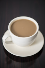 Soft focus Cup of coffee  on table