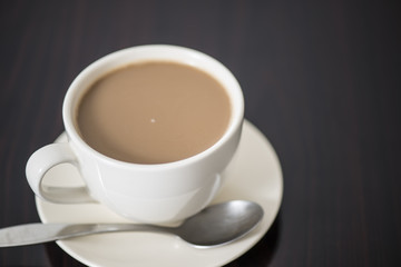 Fototapeta na wymiar Soft focus Cup of coffee on table
