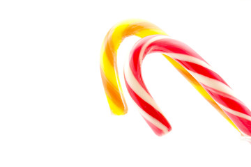 Christmas candy canes red yellow isolated on white background
