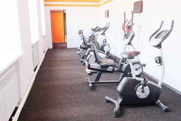 Fototapeta na wymiar exercise bicycle in a fitness hall
