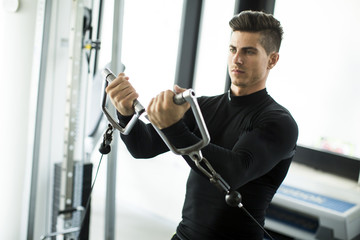 Young man training in the gym