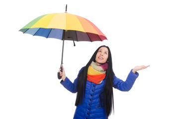 Pretty girl in blue winter jacket isolated on white