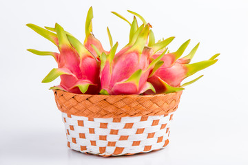 Obraz premium Dragon fruit in bamboo basket