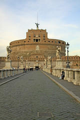 ROME, ITALY - DECEMBER 20, 2012: People on the bridge of Castel Sant'Angelo in Rome, Italy