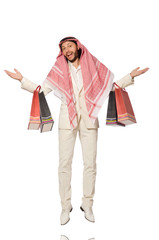 Arab man with shopping bags on white