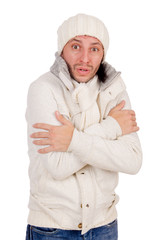 Young man in winter clothes isolated on white