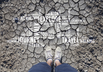 Conceptual men foot on shoes from an aerial view standing on cracked dried soil ground with added...