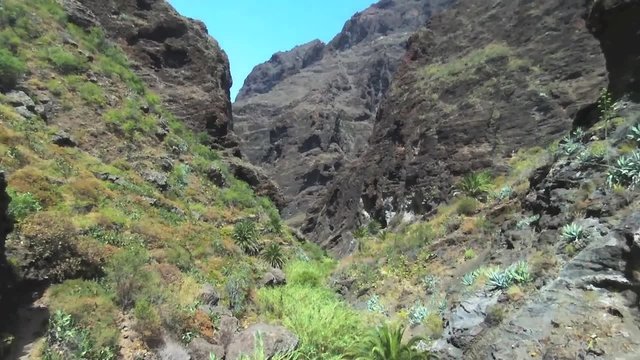 Aerial footage of scenic volcanic landscape in  Masca canyon and cliffs, in Tenerife, Canary islands, Spain.