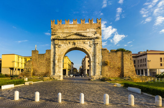 Arch of Augustus in Rimini, Italy - ancient romanesque gate of the city - historical italian landmark