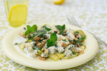 salad with squash, blue cheese, walnuts and yogurt dressing