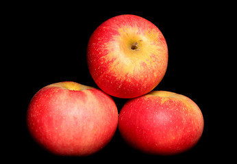 Three red apples