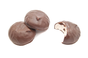 some zephyr with chocolate on white