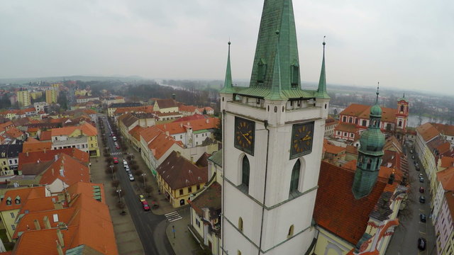Aerial view of quiet street, cosy lane in old city downtown, few cars, no people