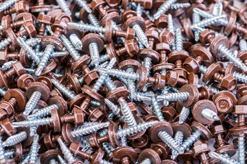 Many screws arranged as background