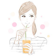 ジュースを飲む女性