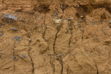 Soil water eroded the rock.