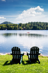Adirondack chairs. Mirror Lake, Lake Placid New York. Summer, vacation, outdoors, travel, explore, nature, camping, lake and mountain vacation concept