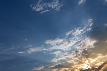 colorful sunset sky background with clouds and sun light