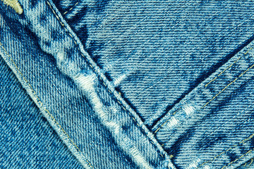 Blue denim fabric with seam