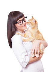 Portrait of a beautiful woman holding red cat
